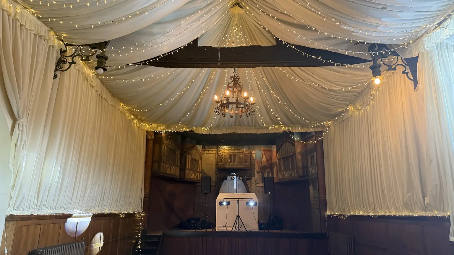 Hurricane Roadshow white DJ stand and lighting at How Caple Court